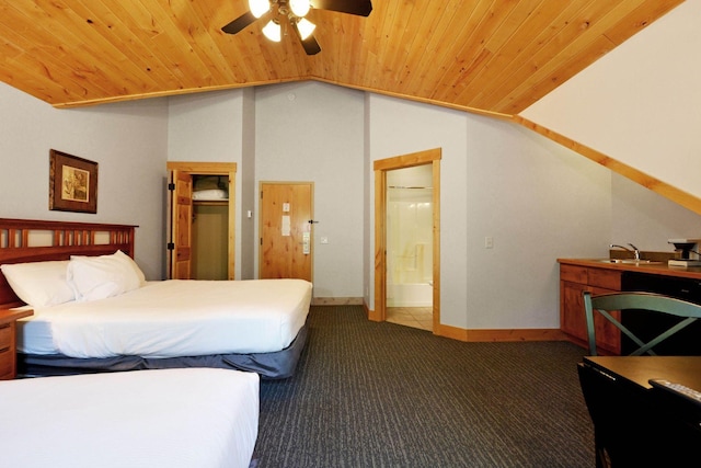 24909 Sandy Ln, Bay Lake Twp, MN 56444 - bedroom with dark colored carpet, wood ceiling, lofted ceiling, and connected bathroom