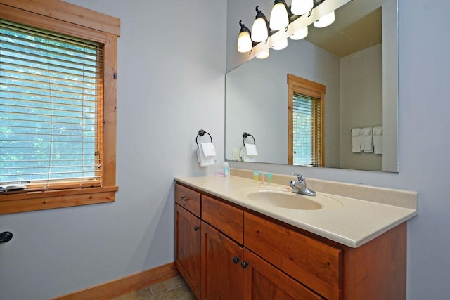 24909 Sandy Ln, Bay Lake Twp, MN 56444 - bathroom with vanity and tile patterned flooring