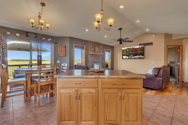 511 8th St SW, Rice, MN 56367 - kitchen with a chandelier, open floor plan, healthy amount of natural light, lofted ceiling, and recessed lighting
