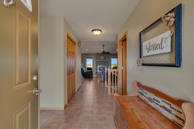 511 8th St SW, Rice, MN 56367 - hallway with light tile patterned flooring and baseboards