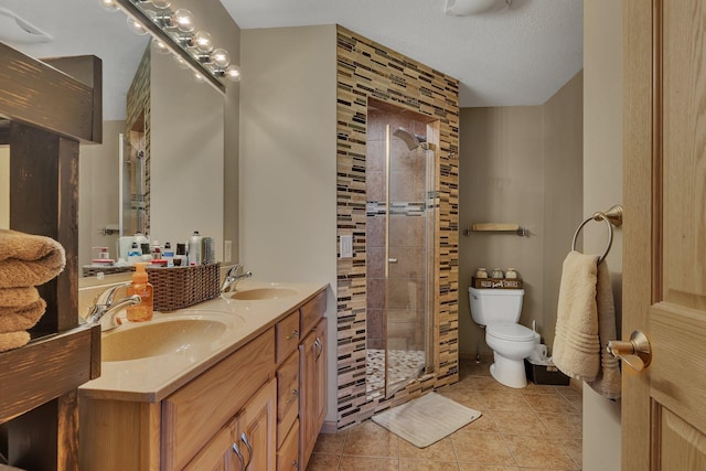 511 8th St SW, Rice, MN 56367 - bathroom featuring double vanity, a tile shower, and tile patterned flooring