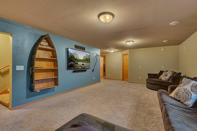 511 8th St SW, Rice, MN 56367 - carpeted living room with a textured ceiling