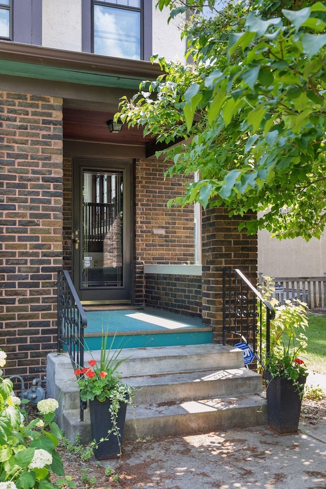 1088 Lincoln Ave, Saint Paul, MN 55105 - property entrance featuring brick siding and stucco siding