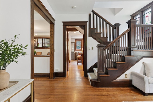 1088 Lincoln Ave, Saint Paul, MN 55105 - staircase featuring wood finished floors and healthy amount of natural light