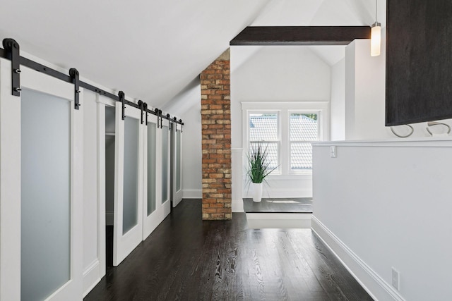 1088 Lincoln Ave, Saint Paul, MN 55105 - hallway featuring a barn door, wood finished floors, and vaulted ceiling