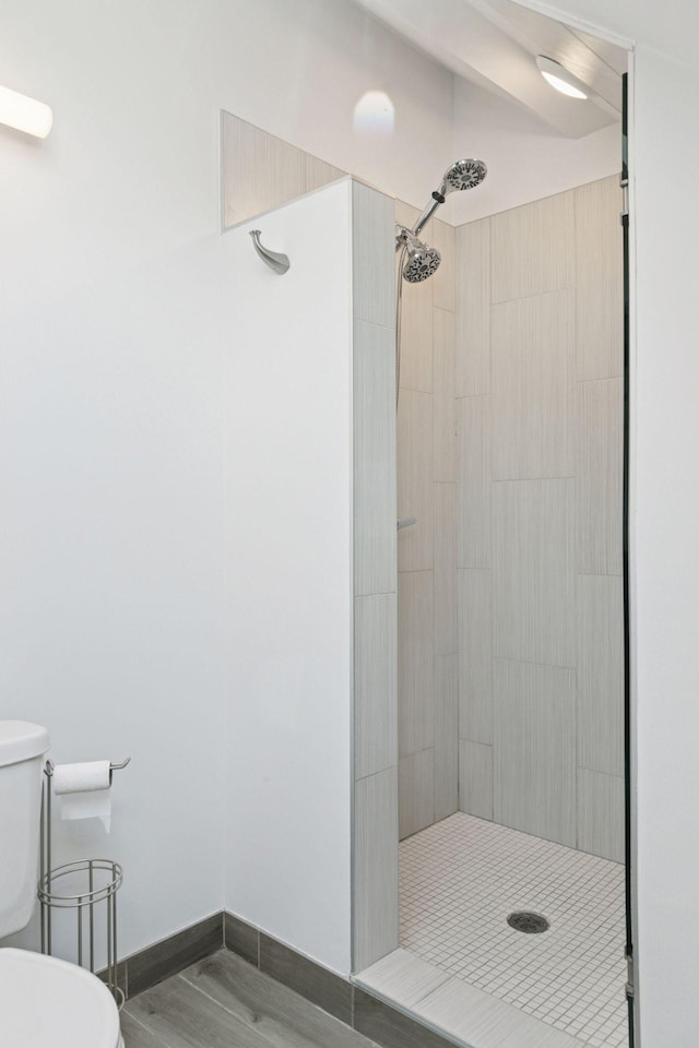 1088 Lincoln Ave, Saint Paul, MN 55105 - bathroom featuring a stall shower and wood finished floors