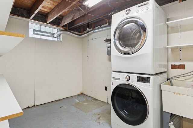 1088 Lincoln Ave, Saint Paul, MN 55105 - laundry area featuring stacked washing machine and dryer