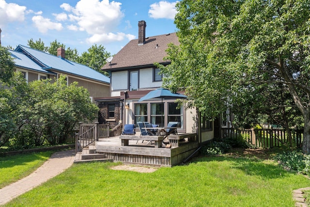 1088 Lincoln Ave, Saint Paul, MN 55105 - back of property with a wooden deck and stucco siding