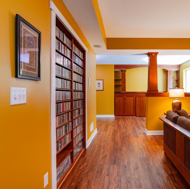 582 Summit Ave, Saint Paul, MN 55102 - hallway featuring built in shelves and wood finished floors