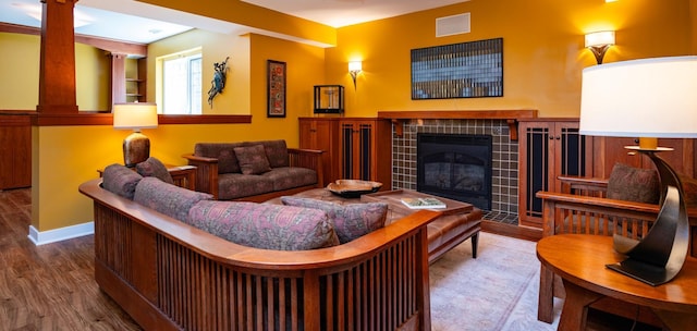 582 Summit Ave, Saint Paul, MN 55102 - living room with wood finished floors and a tile fireplace