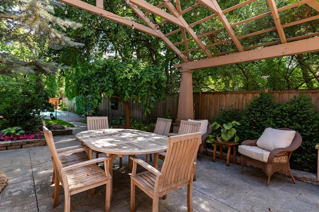 582 Summit Ave, Saint Paul, MN 55102 - fenced backyard with a patio area, outdoor dining area, and a pergola