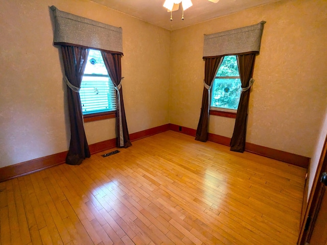 521 Chestnut St, Winona, MN 55987 - spare room with light wood-type flooring and ceiling fan