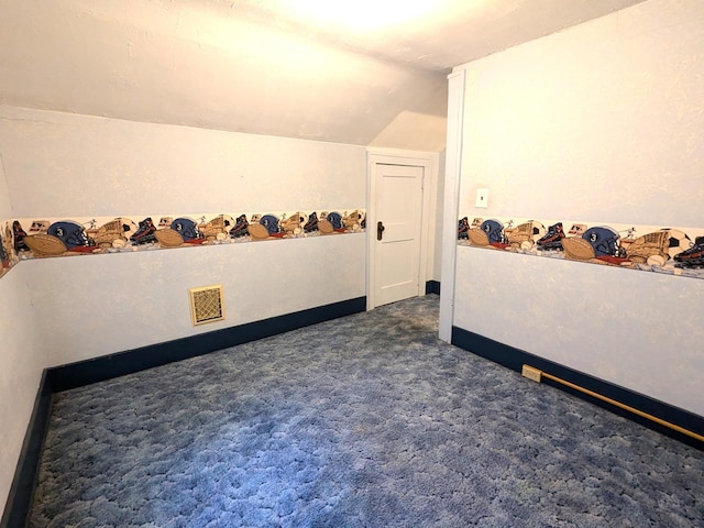 521 Chestnut St, Winona, MN 55987 - additional living space featuring vaulted ceiling and dark colored carpet