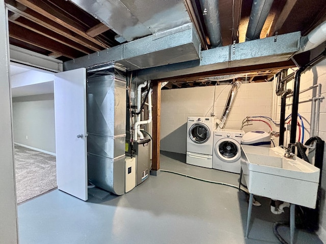 1414 Danube Rd, Fridley, MN 55432 - unfinished below grade area featuring washer and clothes dryer and heating unit