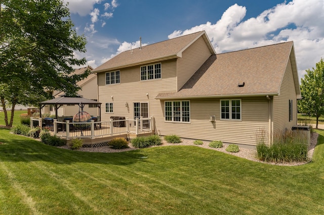 2944 Mayowood Common Cir SW, Rochester, MN 55902 - rear view of house with a gazebo, a lawn, a deck, and roof with shingles