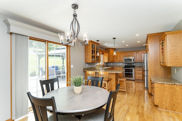 2944 Mayowood Common Cir SW, Rochester, MN 55902 - dining area featuring light wood-type flooring, recessed lighting, and a chandelier