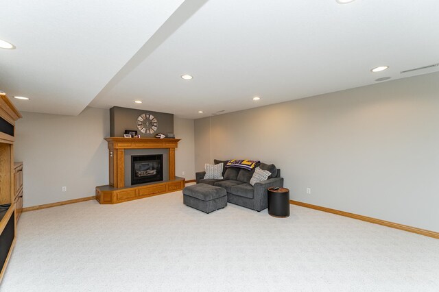 2944 Mayowood Common Cir SW, Rochester, MN 55902 - living area with a glass covered fireplace, carpet, and recessed lighting