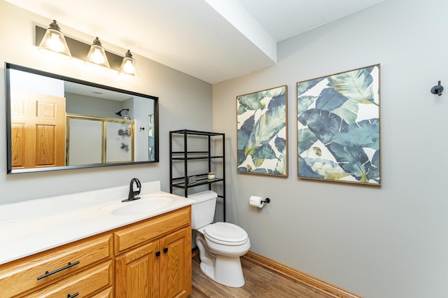 2944 Mayowood Common Cir SW, Rochester, MN 55902 - full bath with wood finished floors, vanity, and an enclosed shower