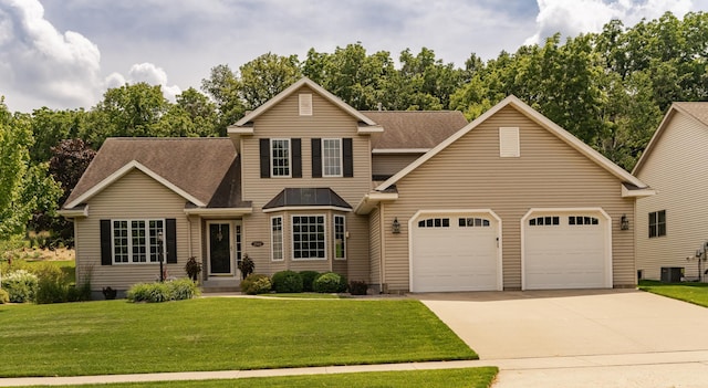 2944 Mayowood Common Cir SW, Rochester, MN 55902 - traditional home with a garage, driveway, a front lawn, and roof with shingles
