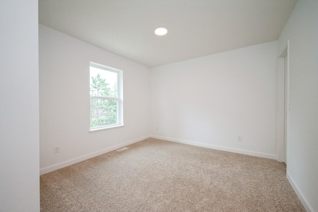 9706 Jasmine Ave NE, Hanover, MN 55341 - spare room with light carpet