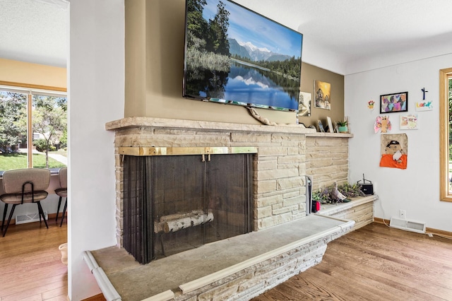 1281 Minnehaha Pkwy, Minneapolis, MN 55419 - detailed view of a stone fireplace and wood finished floors
