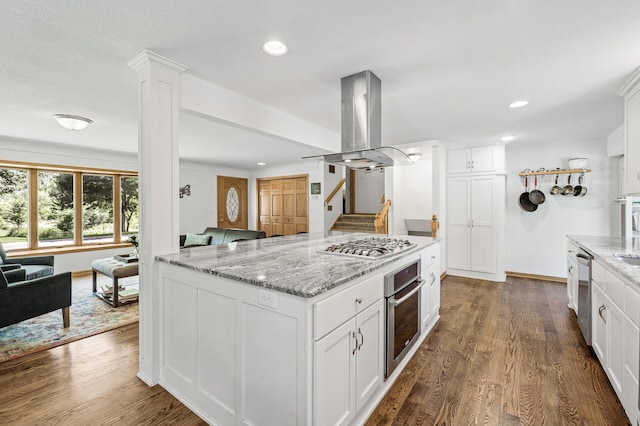 1281 Minnehaha Pkwy, Minneapolis, MN 55419 - kitchen featuring island range hood, stainless steel appliances, open floor plan, recessed lighting, and dark wood-style floors