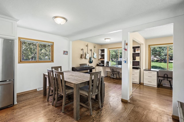 1281 Minnehaha Pkwy, Minneapolis, MN 55419 - dining room with dark wood finished floors and an office area
