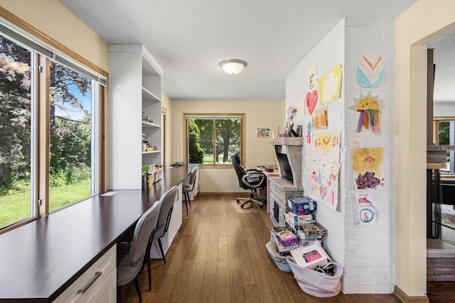 1281 Minnehaha Pkwy, Minneapolis, MN 55419 - office featuring wood finished floors and a textured ceiling
