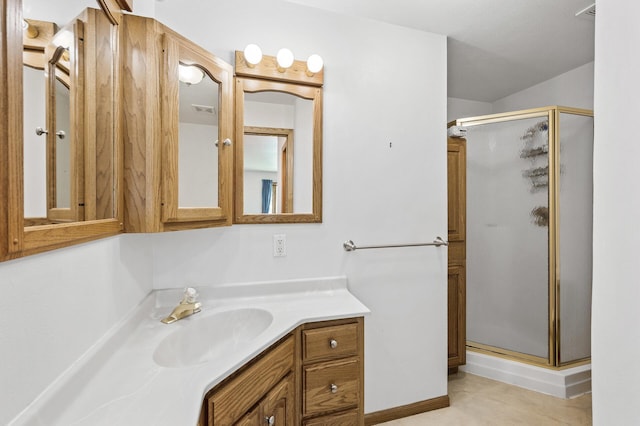 1281 Minnehaha Pkwy, Minneapolis, MN 55419 - bathroom with vanity, a stall shower, and tile patterned floors