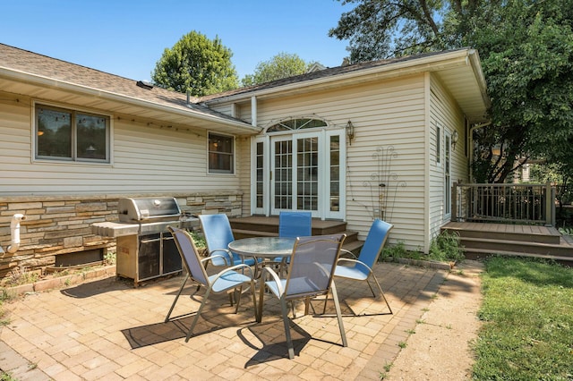 1281 Minnehaha Pkwy, Minneapolis, MN 55419 - view of patio featuring grilling area and outdoor dining space