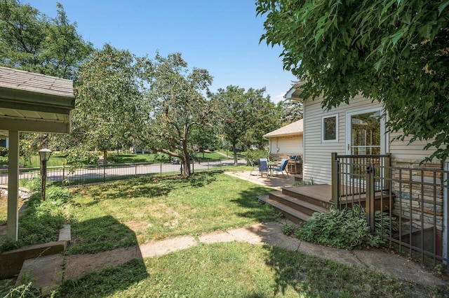 1281 Minnehaha Pkwy, Minneapolis, MN 55419 - view of yard with a wooden deck
