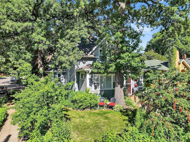 4356 Nokomis Ave, Minneapolis, MN 55406 - obstructed view of property with a front yard