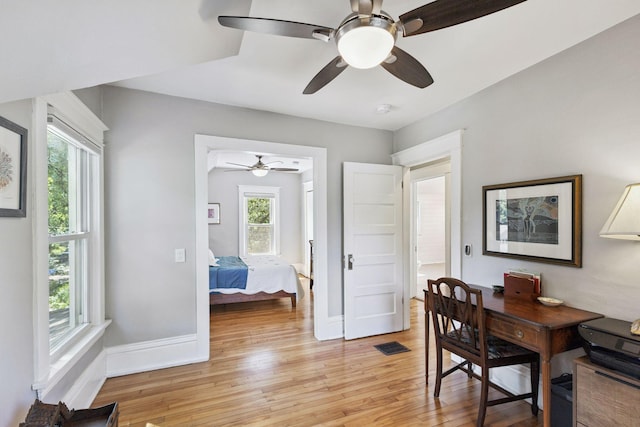 4356 Nokomis Ave, Minneapolis, MN 55406 - office area featuring light wood finished floors and a ceiling fan