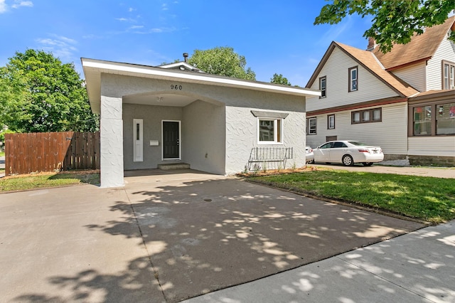 960 Burr St, Saint Paul, MN 55130 - view of front of home featuring concrete driveway and stucco siding