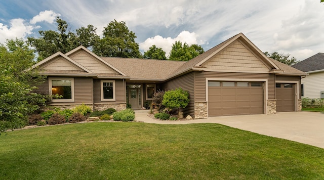 4089 Stone Point Dr NE, Rochester, MN 55906 - craftsman house with stone siding, a garage, concrete driveway, and a front yard