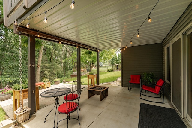 4089 Stone Point Dr NE, Rochester, MN 55906 - view of patio featuring a fire pit and outdoor dining space