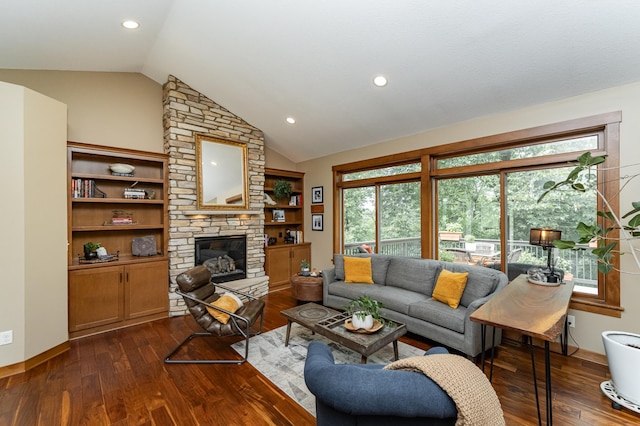 4089 Stone Point Dr NE, Rochester, MN 55906 - living area featuring dark wood-style flooring, lofted ceiling, a stone fireplace, and recessed lighting