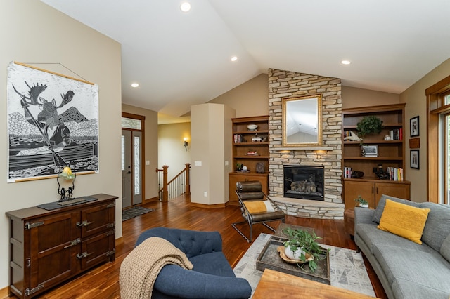 4089 Stone Point Dr NE, Rochester, MN 55906 - living room with lofted ceiling, dark wood-style flooring, a stone fireplace, and recessed lighting