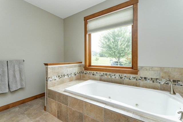 4089 Stone Point Dr NE, Rochester, MN 55906 - bathroom with a jetted tub and tile patterned floors