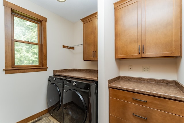 4089 Stone Point Dr NE, Rochester, MN 55906 - washroom with cabinet space and washer and clothes dryer