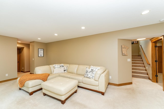 4089 Stone Point Dr NE, Rochester, MN 55906 - living area with light colored carpet, recessed lighting, and stairway