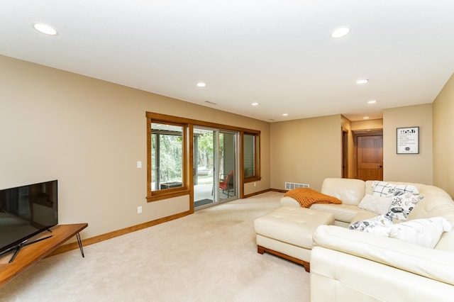 4089 Stone Point Dr NE, Rochester, MN 55906 - living room with recessed lighting and light colored carpet