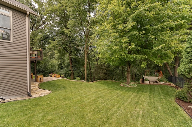 4089 Stone Point Dr NE, Rochester, MN 55906 - view of yard with a patio area and a wooden deck