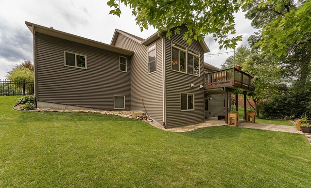 4089 Stone Point Dr NE, Rochester, MN 55906 - view of side of home featuring a patio area and a wooden deck
