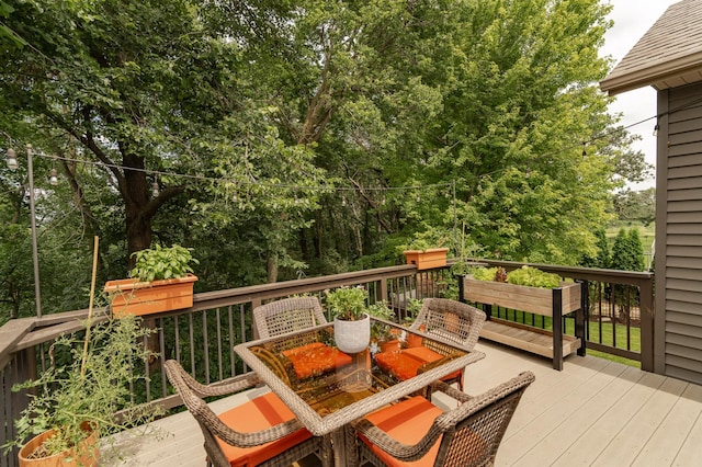 4089 Stone Point Dr NE, Rochester, MN 55906 - wooden terrace with outdoor dining area
