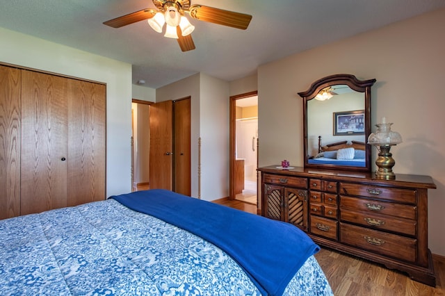 5551 Nancy Ln NW, Rochester, MN 55901 - bedroom featuring wood finished floors and ceiling fan