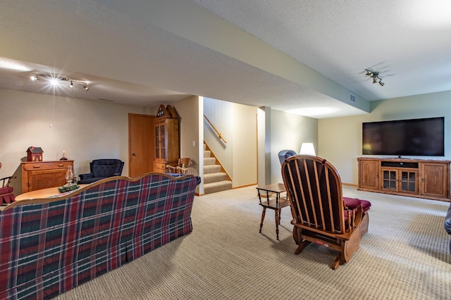 5551 Nancy Ln NW, Rochester, MN 55901 - living room with track lighting, light carpet, and stairs