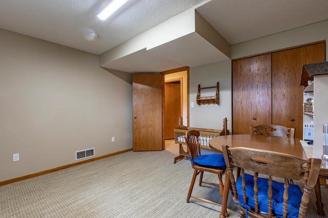5551 Nancy Ln NW, Rochester, MN 55901 - dining area with light carpet and baseboards