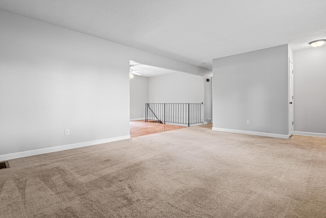 8210 Red Oak Dr, Mounds View, MN 55112 - empty room with light colored carpet and a ceiling fan