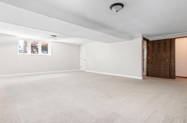 8210 Red Oak Dr, Mounds View, MN 55112 - additional living space with carpet and a textured ceiling